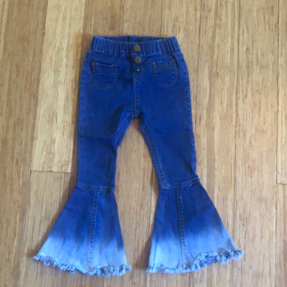 Boutique bell bottom bleached jeans